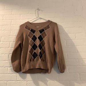 we are selling a brown sweater vest cardigan